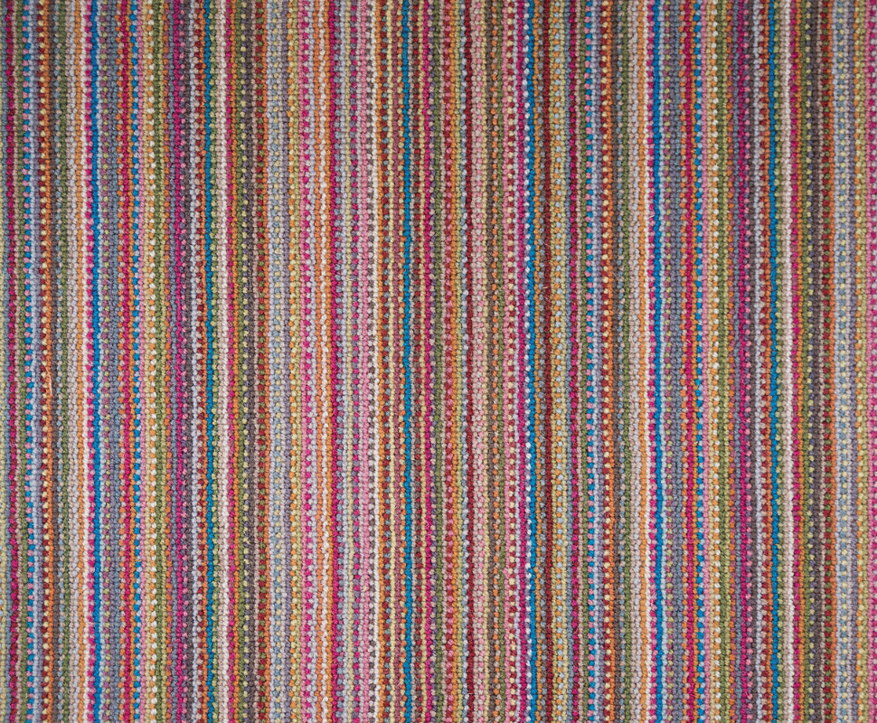 Parallel vertical pinstripes in hot pink, cyan blue, lime green, and purple tightly woven in wool loop.