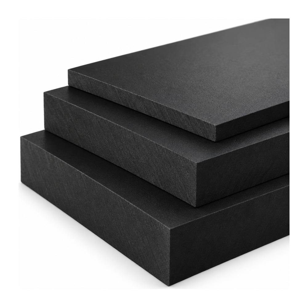 Black ABS plastic plate stock stacked in three thicknesses showing matte faces and cut edges