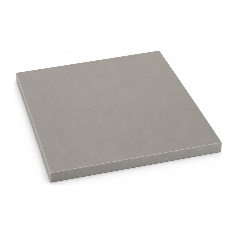 Gray ceramic-filled PEEK plastic plate with matte finish and square cut edges on white background